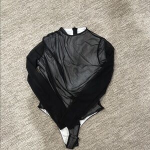 Woman's Black Sheer One Piece